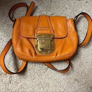 Small Michael Kors orange leather mini crossbody